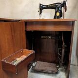 Singer sewing machine in its cabinet