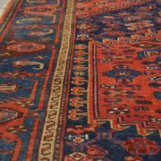 Antique hand-knotted oriental rug with predominantly red, purple, and blue colors 182x136cm