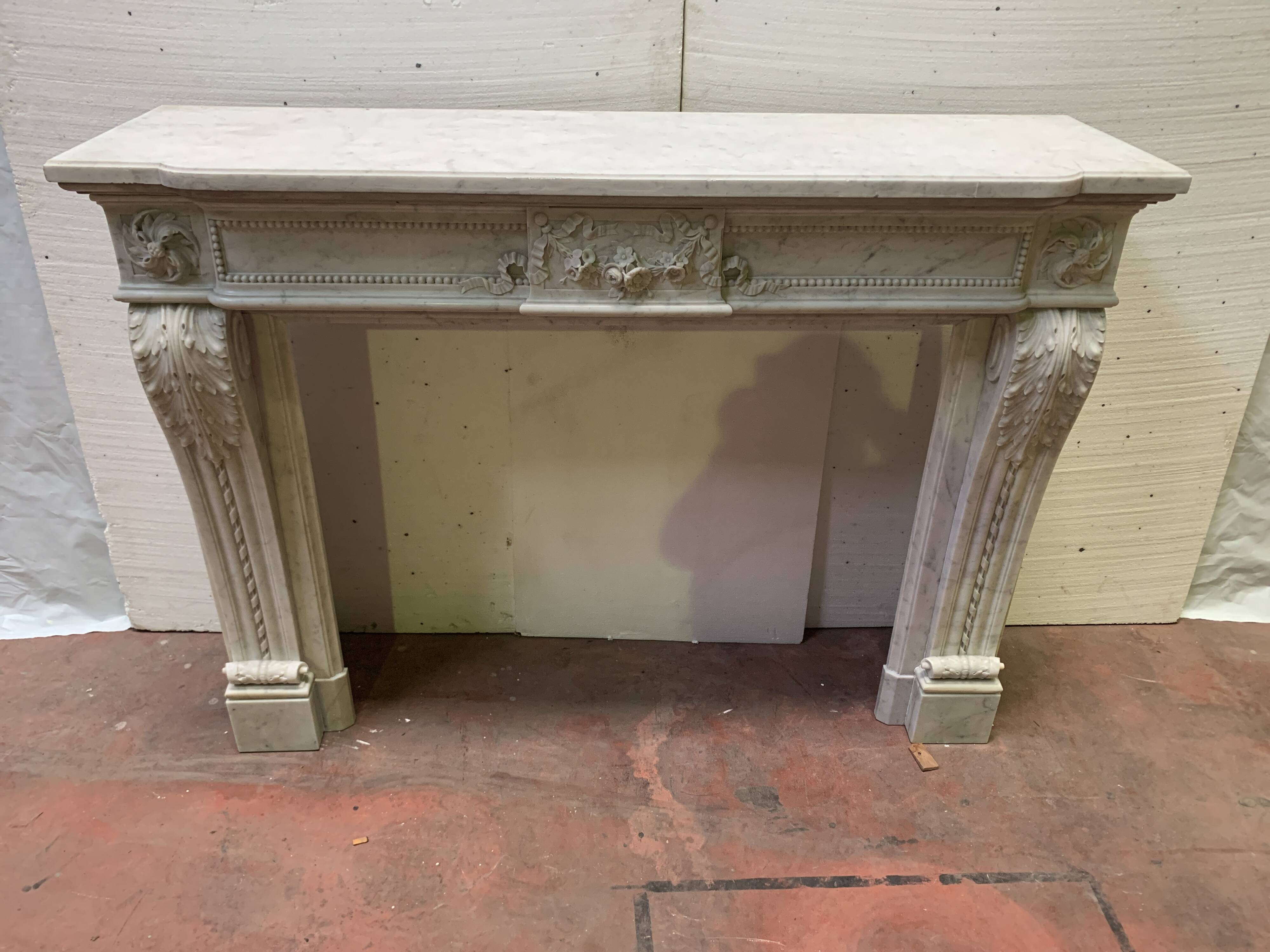 Louis XVI style fireplace in white Carrara marble, 19th century