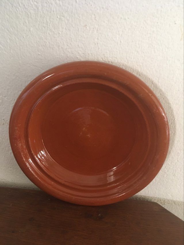 Glazed terracotta dish.