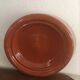 Glazed terracotta dish.