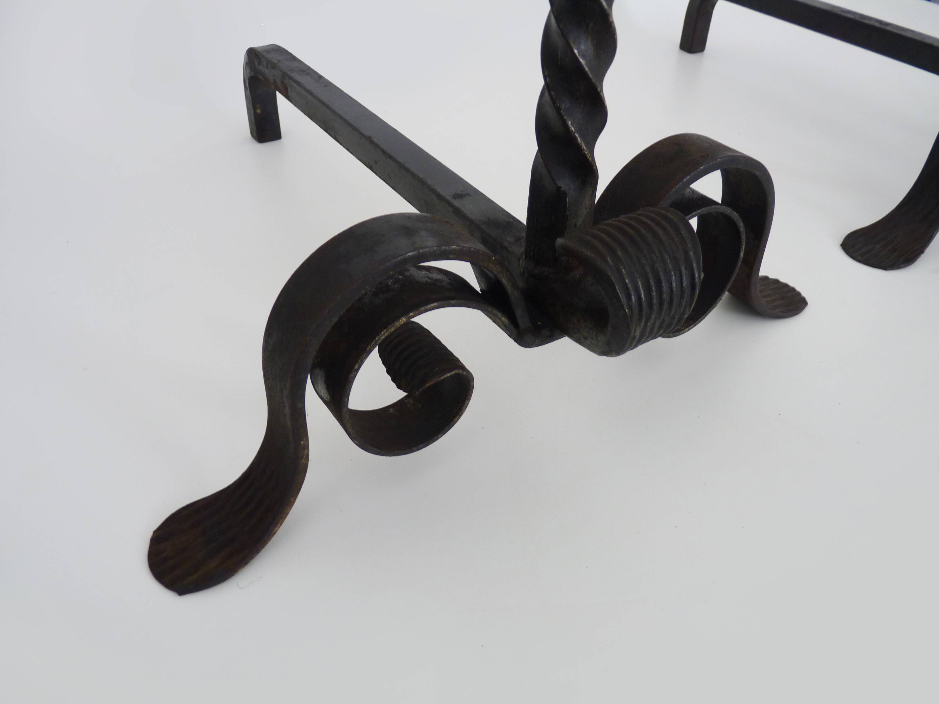 Large pair of wrought iron and brass ball fireplace andirons. 19th century