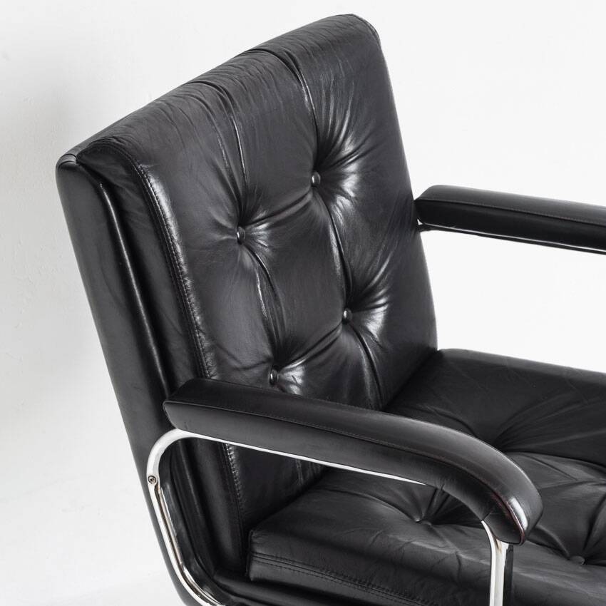 Vintage leather armchair. Swivel, on casters, multi-position. Norway, 1970s.