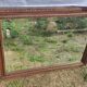 Grand miroir ancien biseauté cadre en bois sculpté