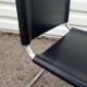 Pair of Bersanelli chairs in black and burgundy leather