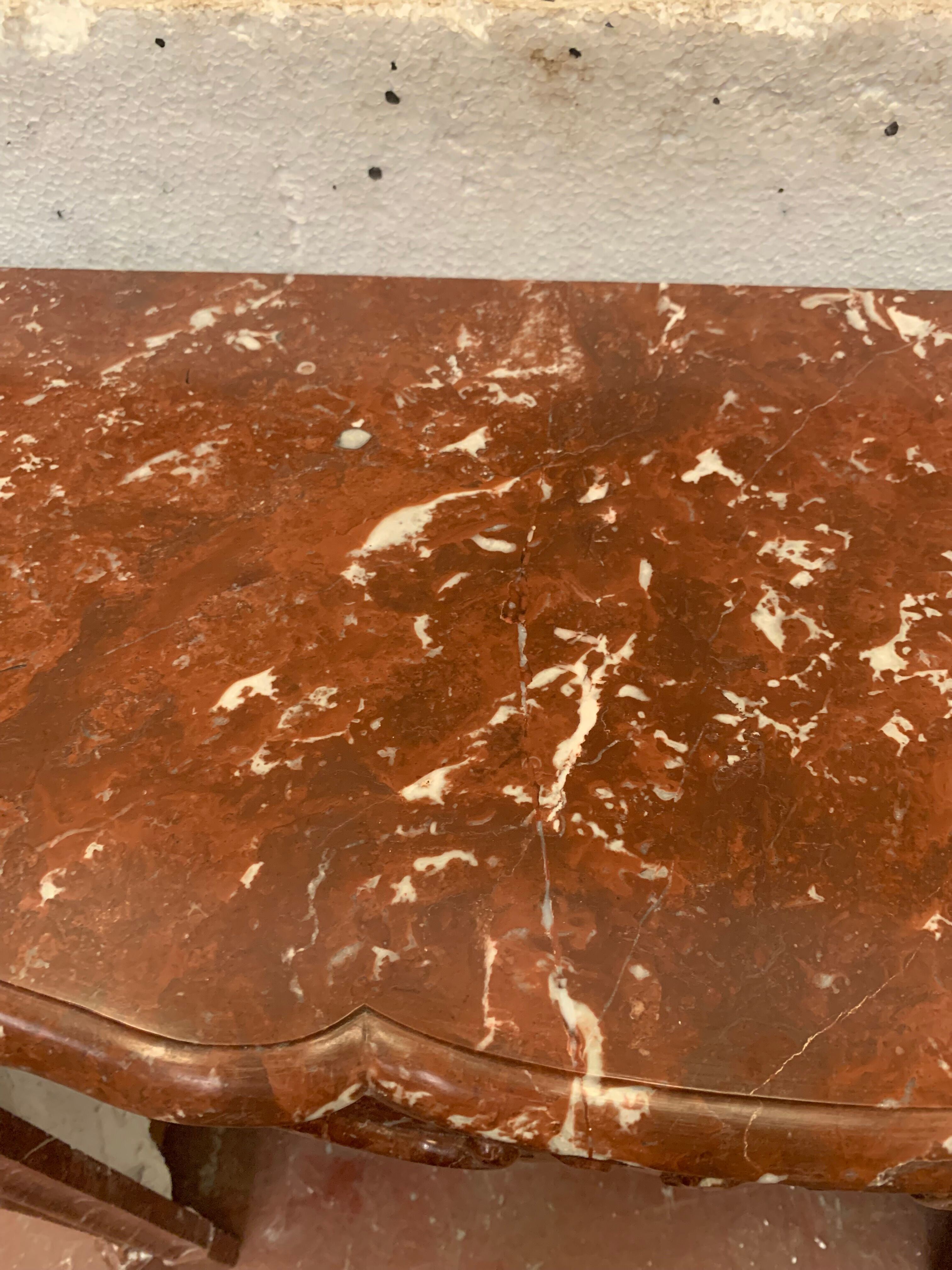 Fireplace three shells louis XV style in royal red marble XIX century