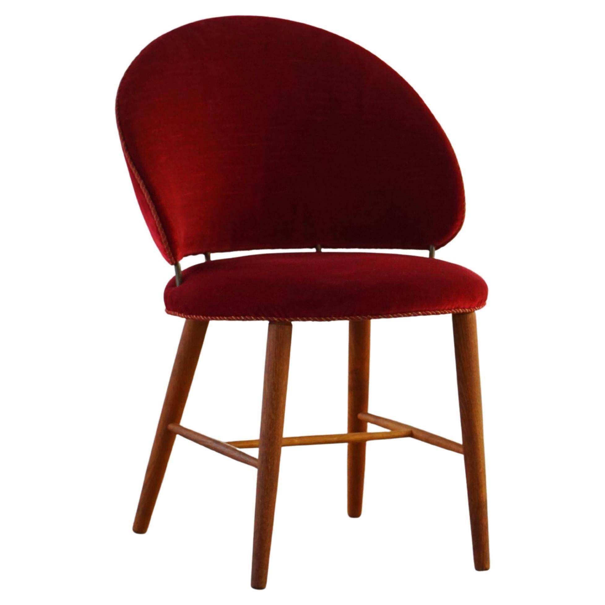 Mid-century toilet chair in oak and red velvet, by a Danish cabinetmaker, 1950s.