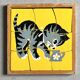 Wooden frame puzzle from the 1940s/50s depicting a cat on a yellow background.