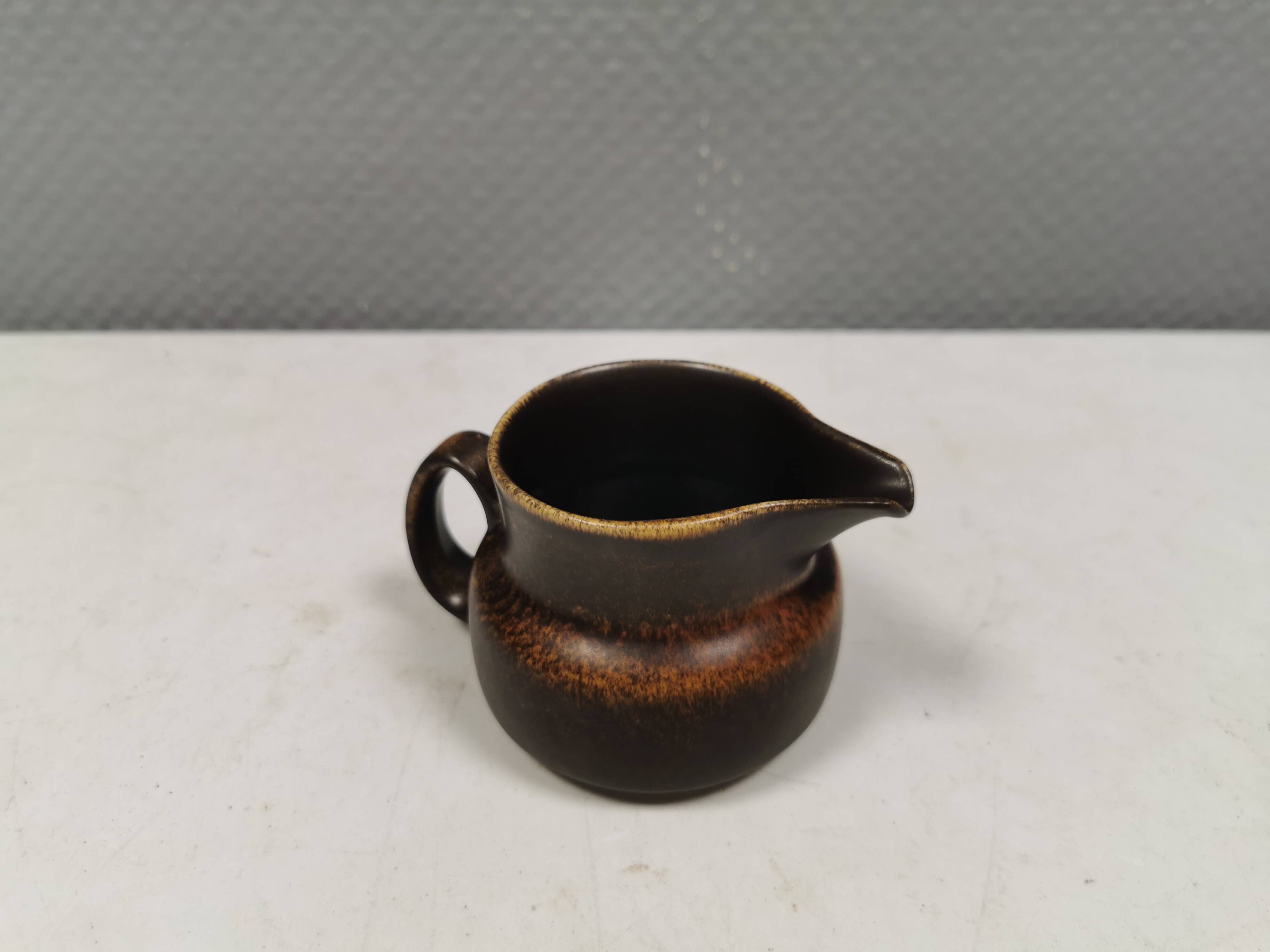 Very nice cream jug in hare fur glaze, Danish and from the 1970-80s.