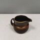Very nice cream jug in hare fur glaze, Danish and from the 1970-80s.