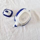 Small porcelain teapot or milk jug with the famous blue willow or weeping pattern