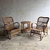 Pair of natural rattan lounge chairs with matching round table — brown mid-century boho set