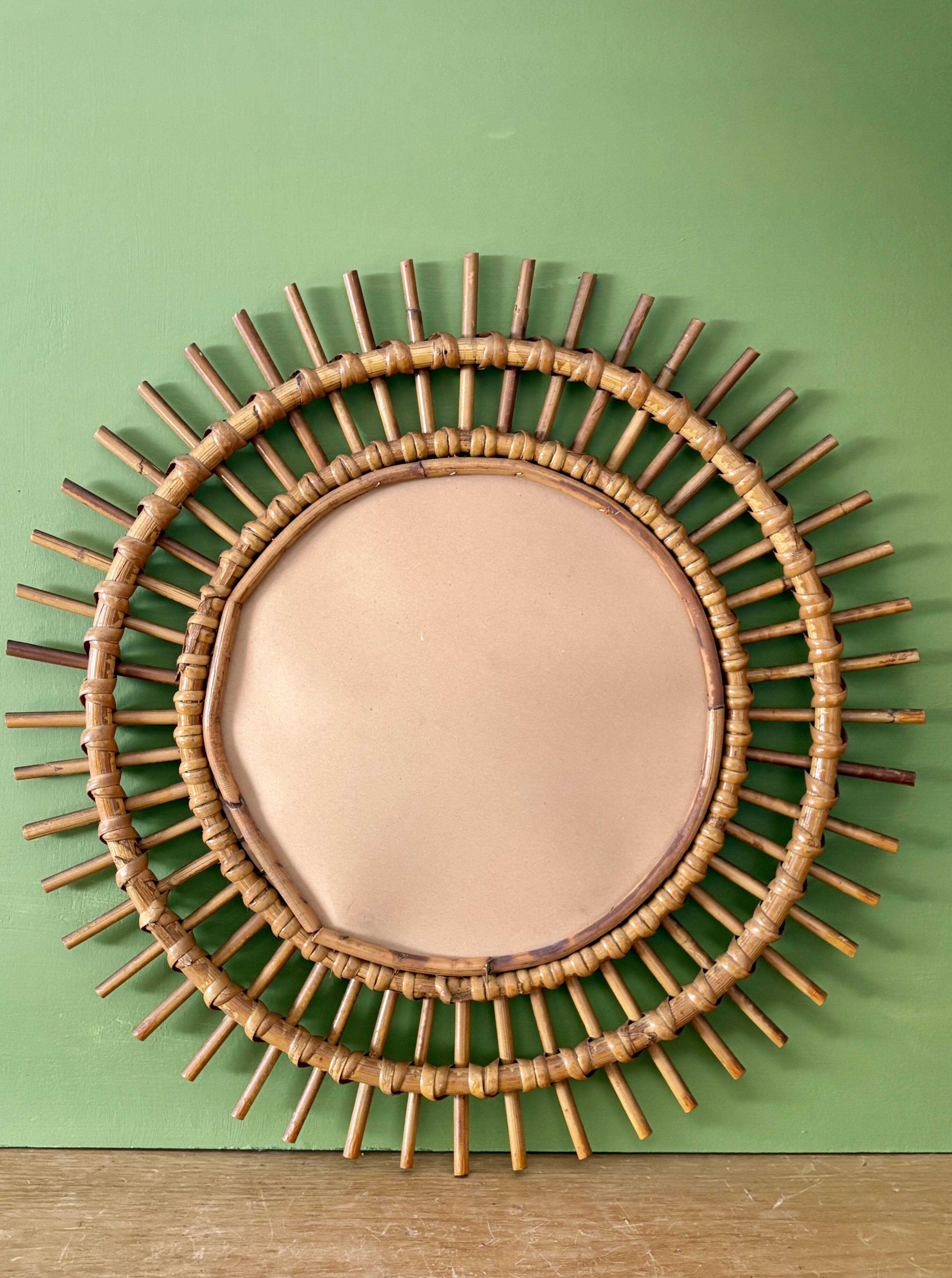 Vintage rattan sun mirror
