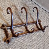 Wall-mounted bistro coat rack with 3 hooks on a late 19th century frame