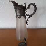Old glass and tin ewer
