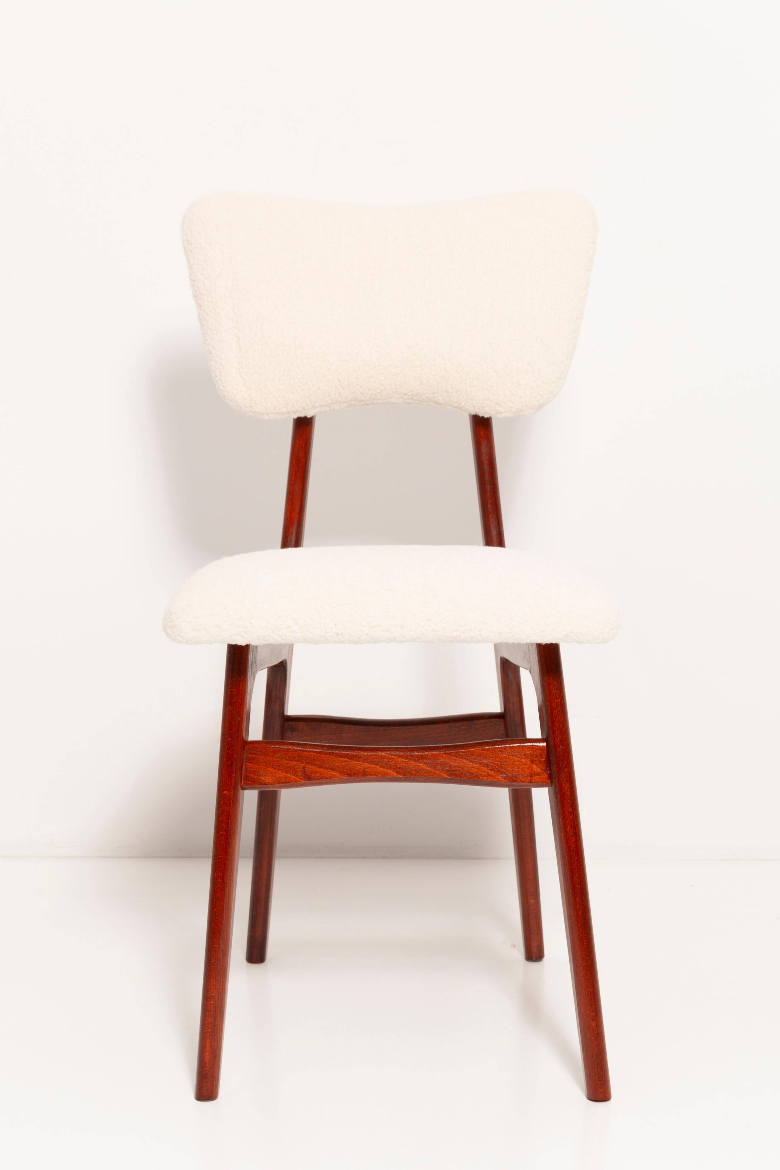 Beech wood armchair in cherry colour with cream boucle fabric - 20th century, Europe, 1960.