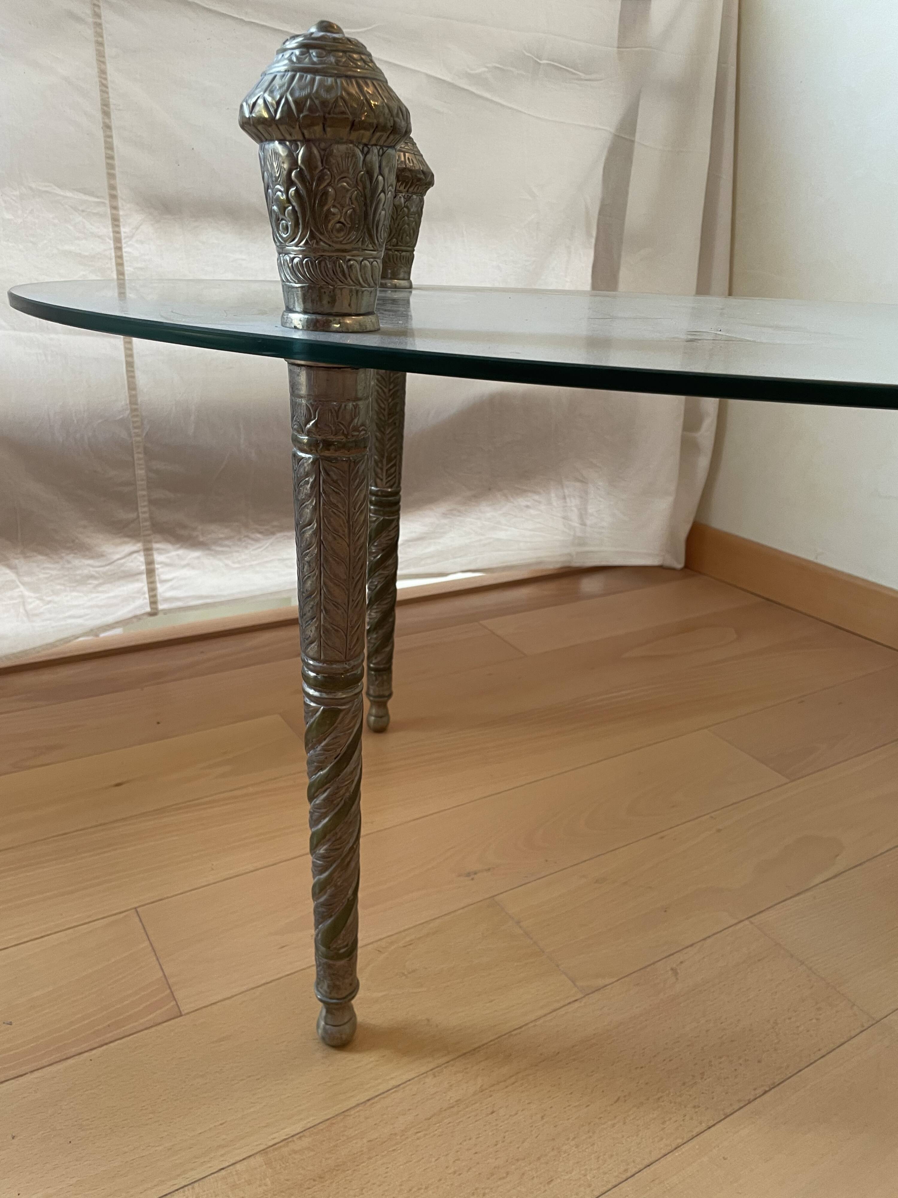 Glass coffee table with metal legs