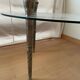 Glass coffee table with metal legs