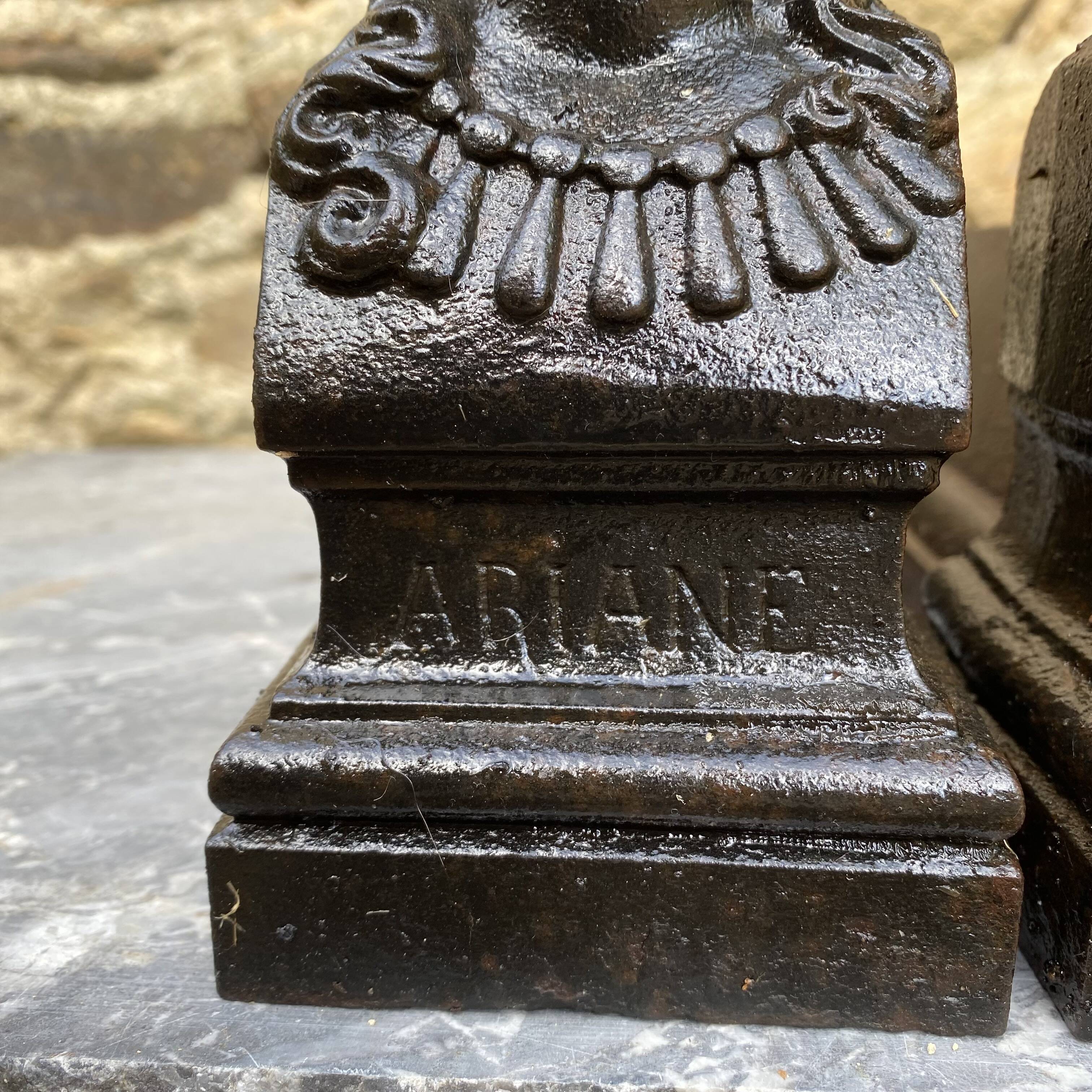 Pair of antique cast iron fire dogs "Ariadne"