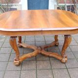 Napoleon III period walnut table from the late 19th century with extensions for 16 covers.