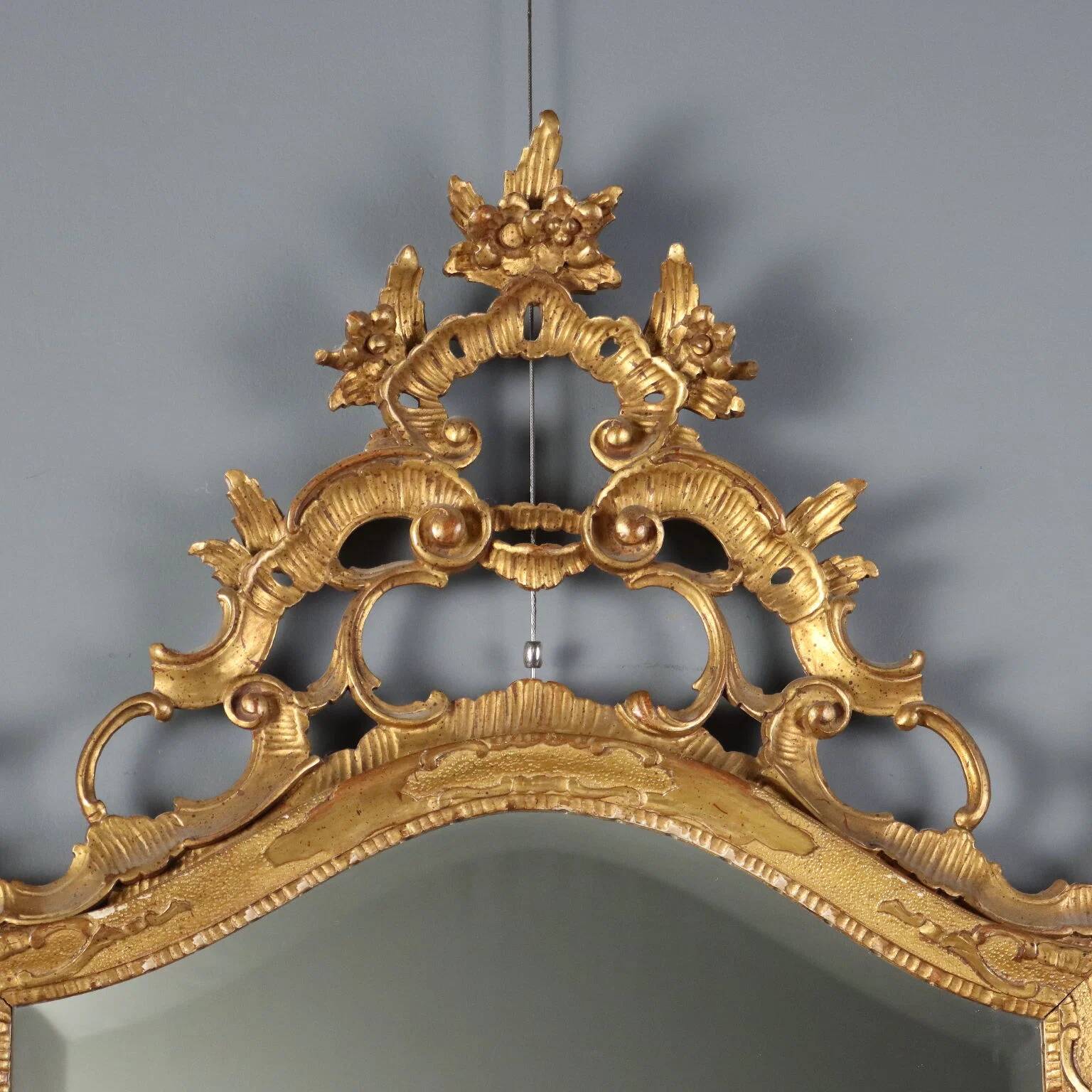 Antique baroque mirror in carved and gilded wood, Italy, 20th century