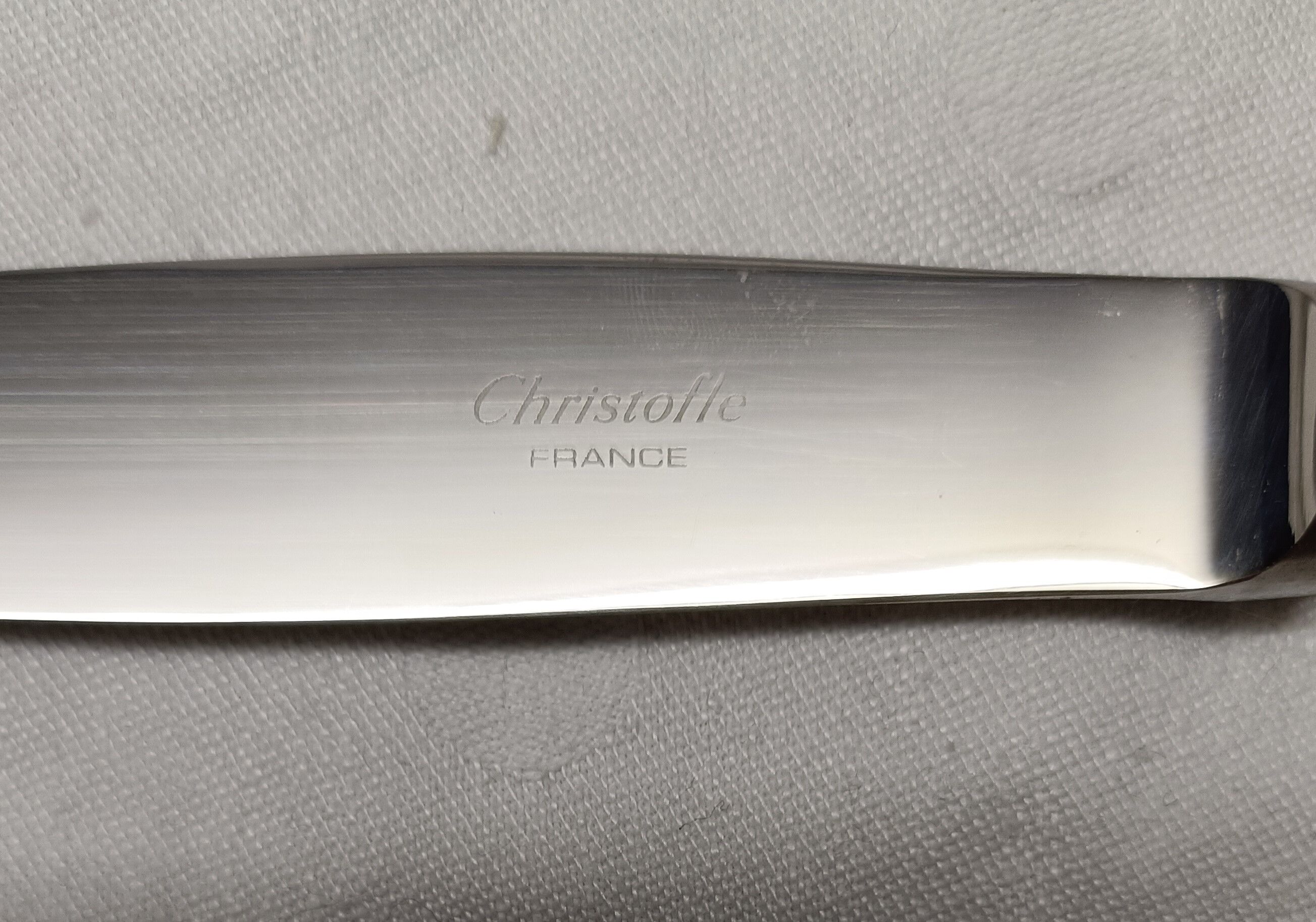 set of 12 silver metal table knives from Christofle model "Spatours"