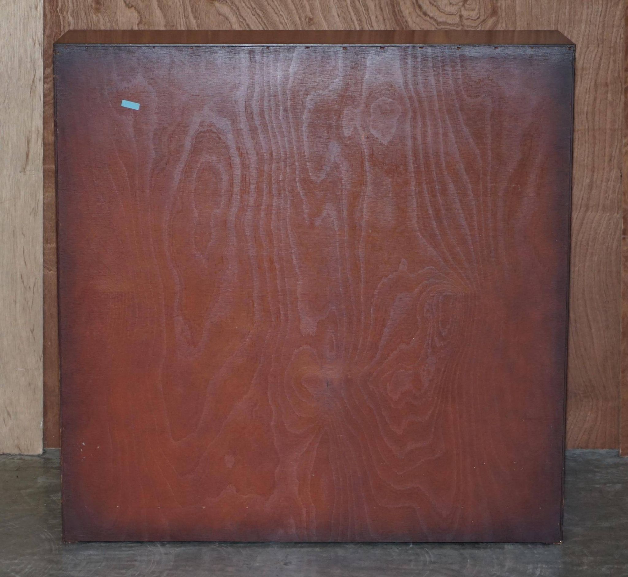 Pair of open dwarf bookshelves in mahogany by Shaws of London.