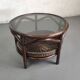 Vintage rattan coffee table with smoked glass top and rattan basket shelf