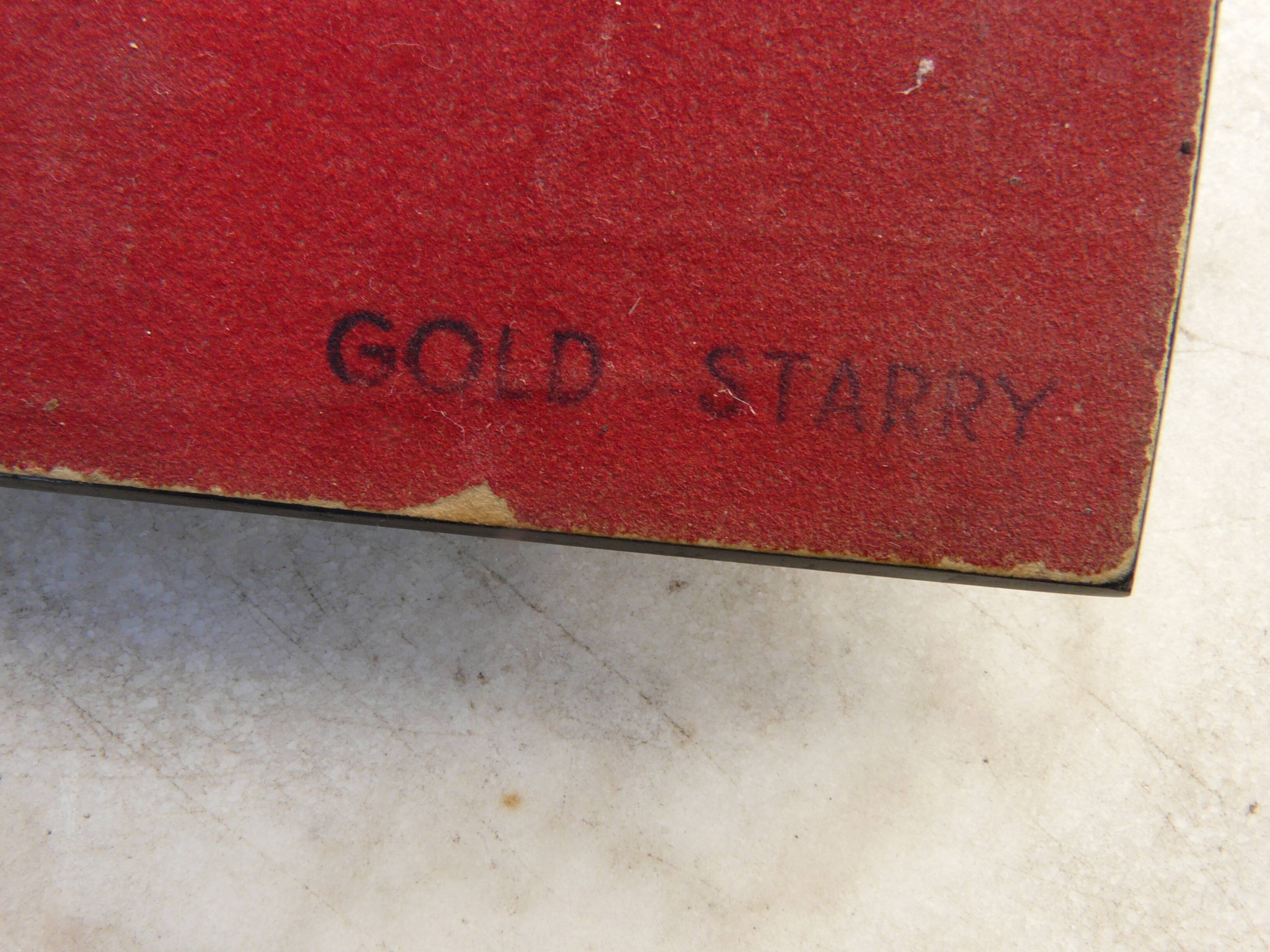 Tubular gold starry perpetual calendar, black base, 1950s
