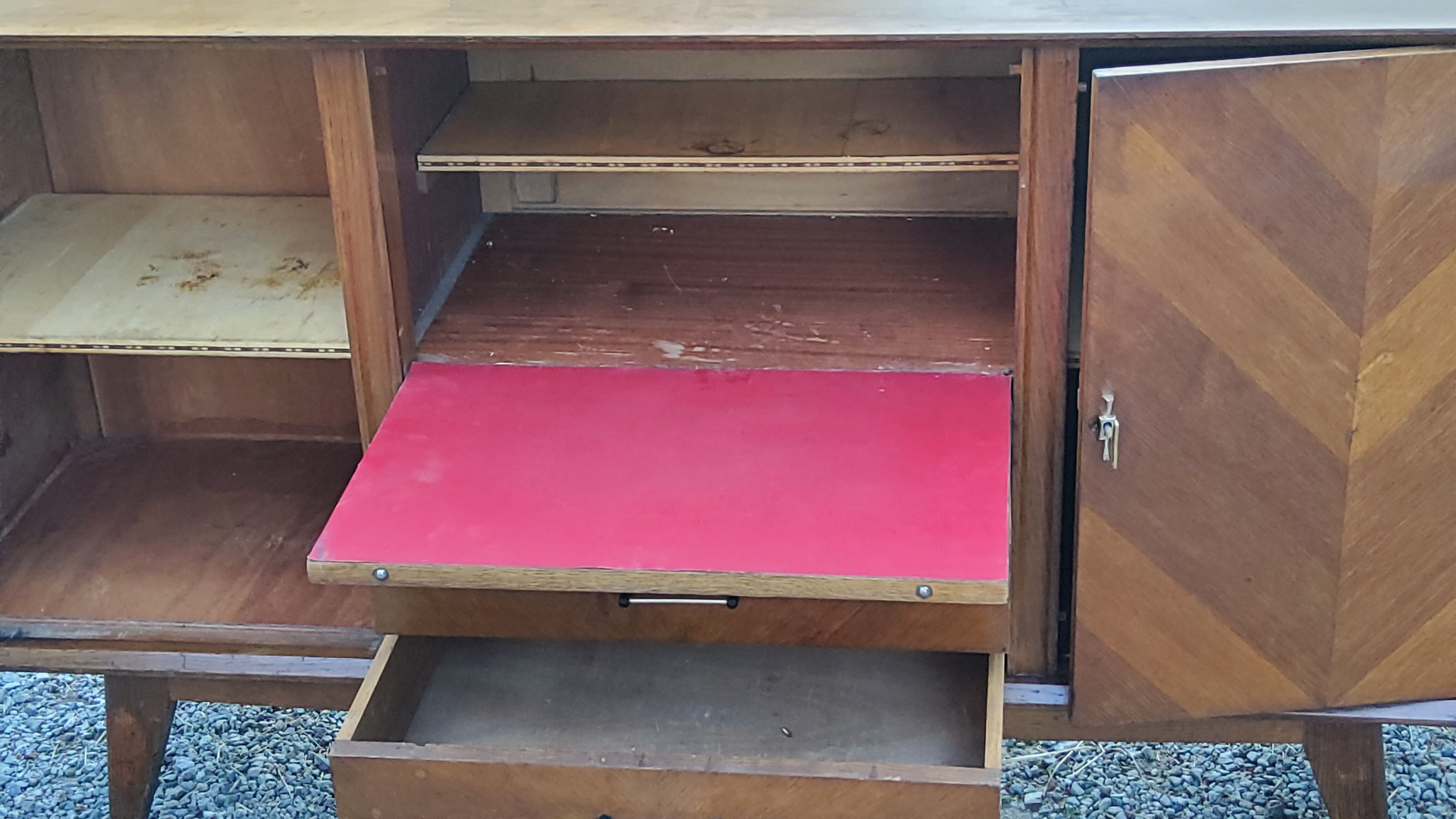 Vintage gold oak row feet compass from the 50s