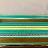 Vintage folding beach chair in chrome metal and woven plastic