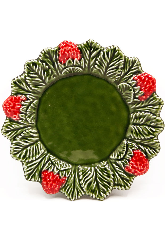 Artisanal plate with strawberries in green and red slurry