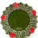 Artisanal plate with strawberries in green and red slurry