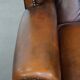 Fauteuil Chesterfield en cuir de vache marron de style anglais