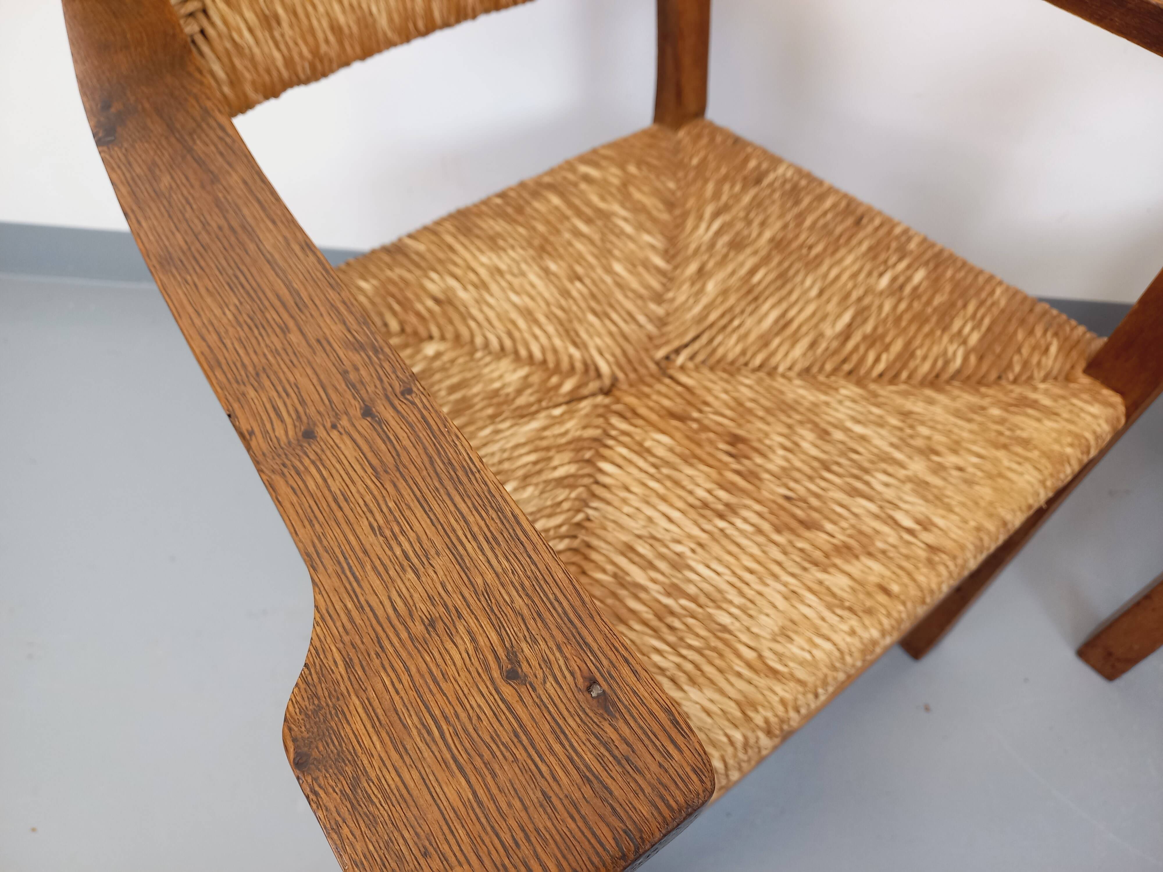 Set of 2 vintage brutalist armchairs in oak wood and straw