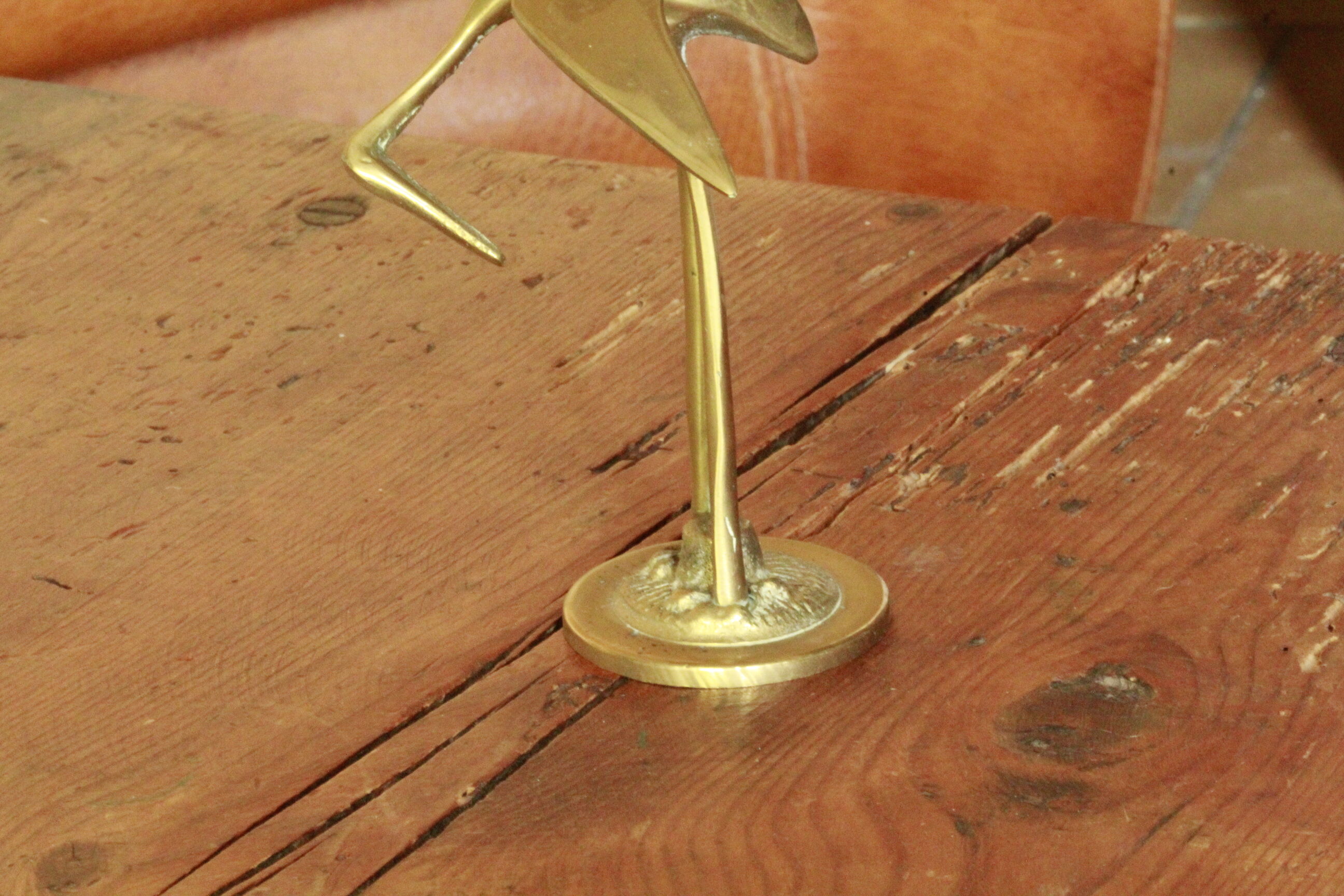 Brass heron statue