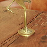 Brass heron statue