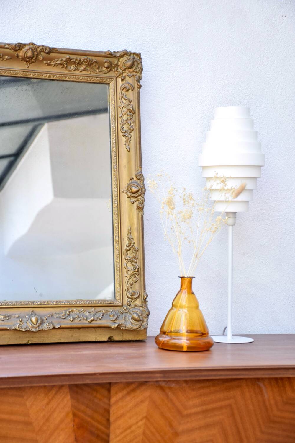 Antique mirror with gilded moldings