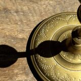 Pair of gilded candlesticks with engraved flower garland motifs H22