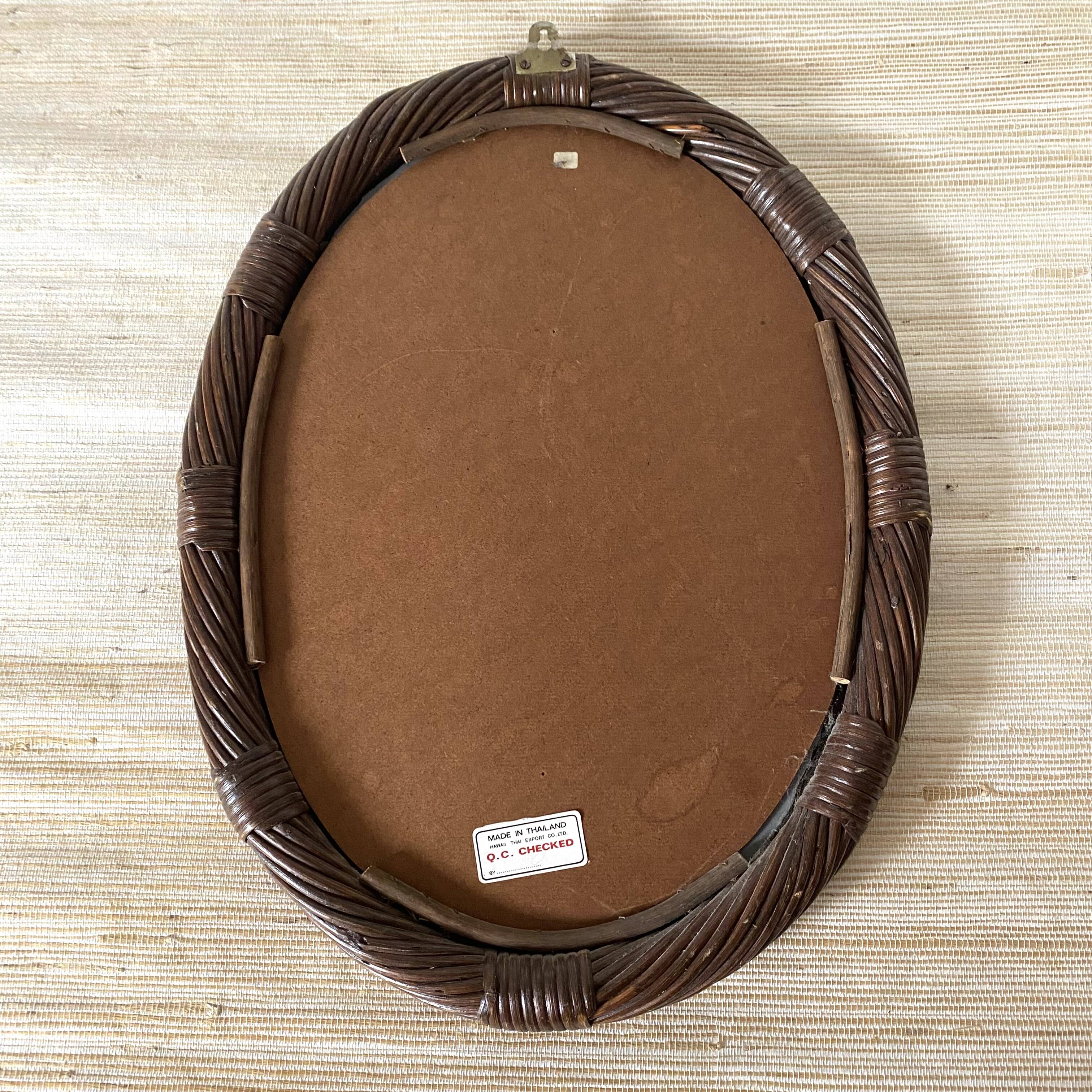 Oval rattan mirror