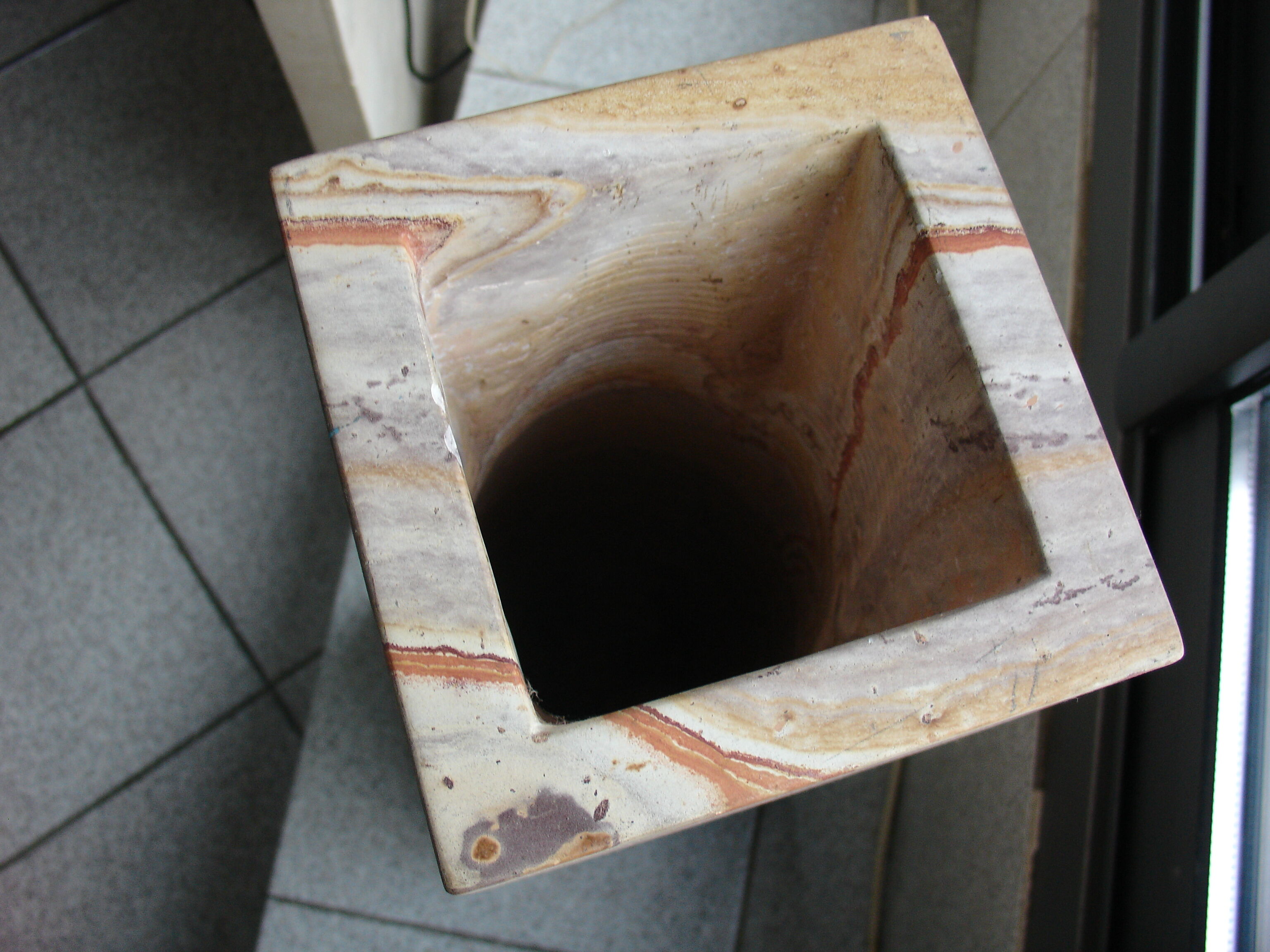 Floor vase in serpentine marble carved from a single block