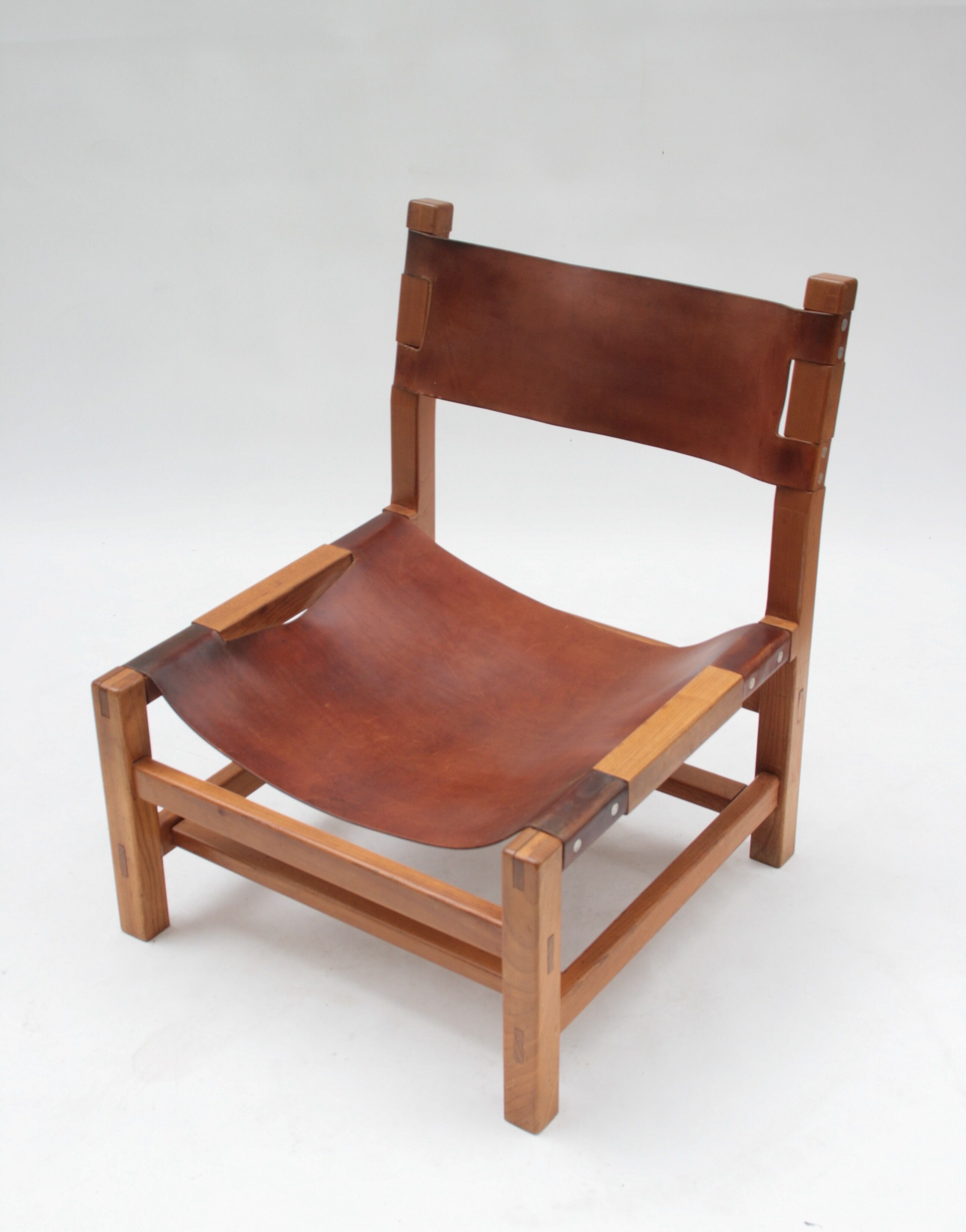 Pair of elm and leather heaters by Maison Regain, 1960s