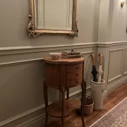 Oval bedside table in Louis XV style made of mahogany.