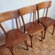 Ensemble de trois chaises bistrot Baumann