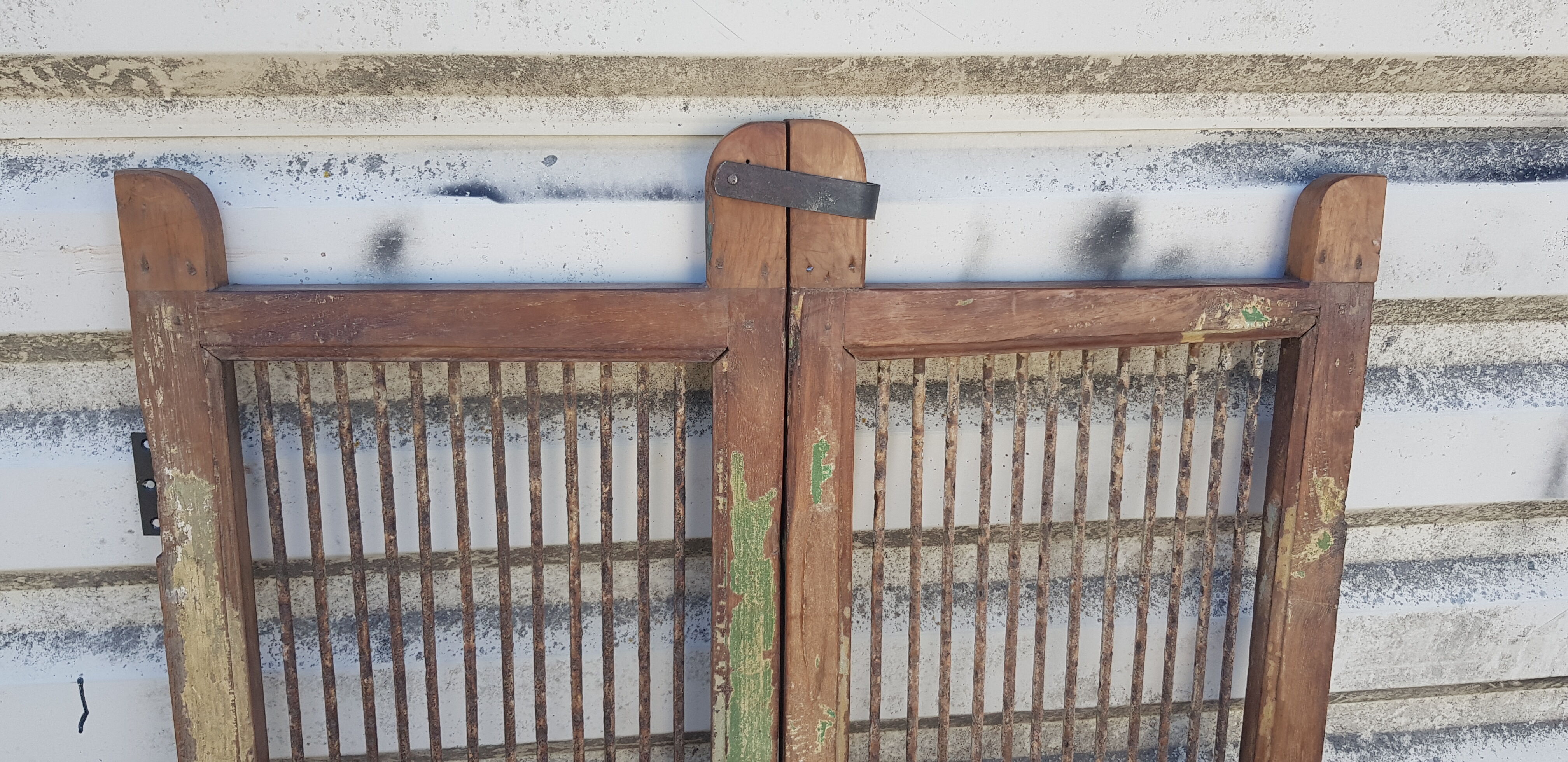 Old teak and wrought iron gate