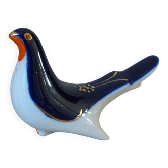 Vintage Soviet salt and pepper shaker in the shape of a cobalt blue bird.