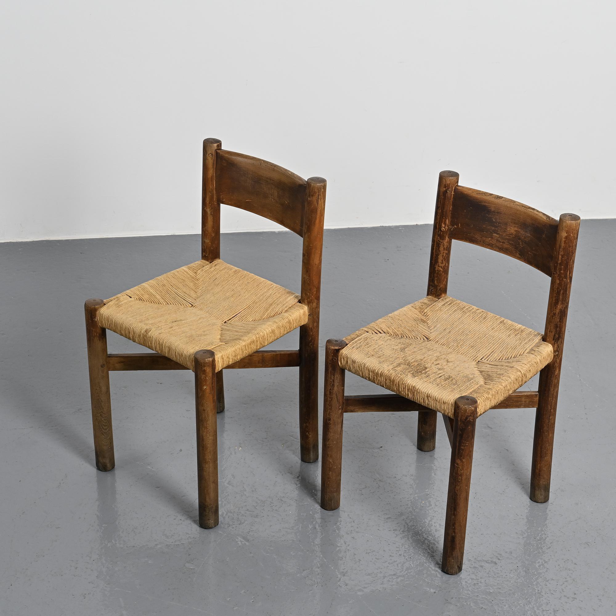 Pair of Méribel chairs by Charlotte Perriand, vintage edition BCB, circa 1950.