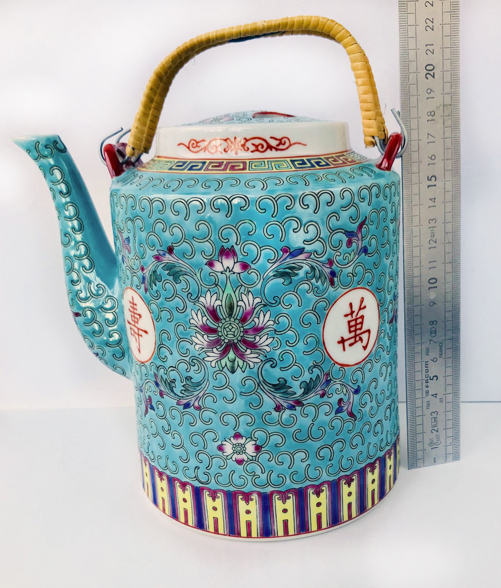 Chinese porcelain tea service with wicker basket