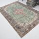 Tapis vintage turc fait main à décor de médaillon vert et beige