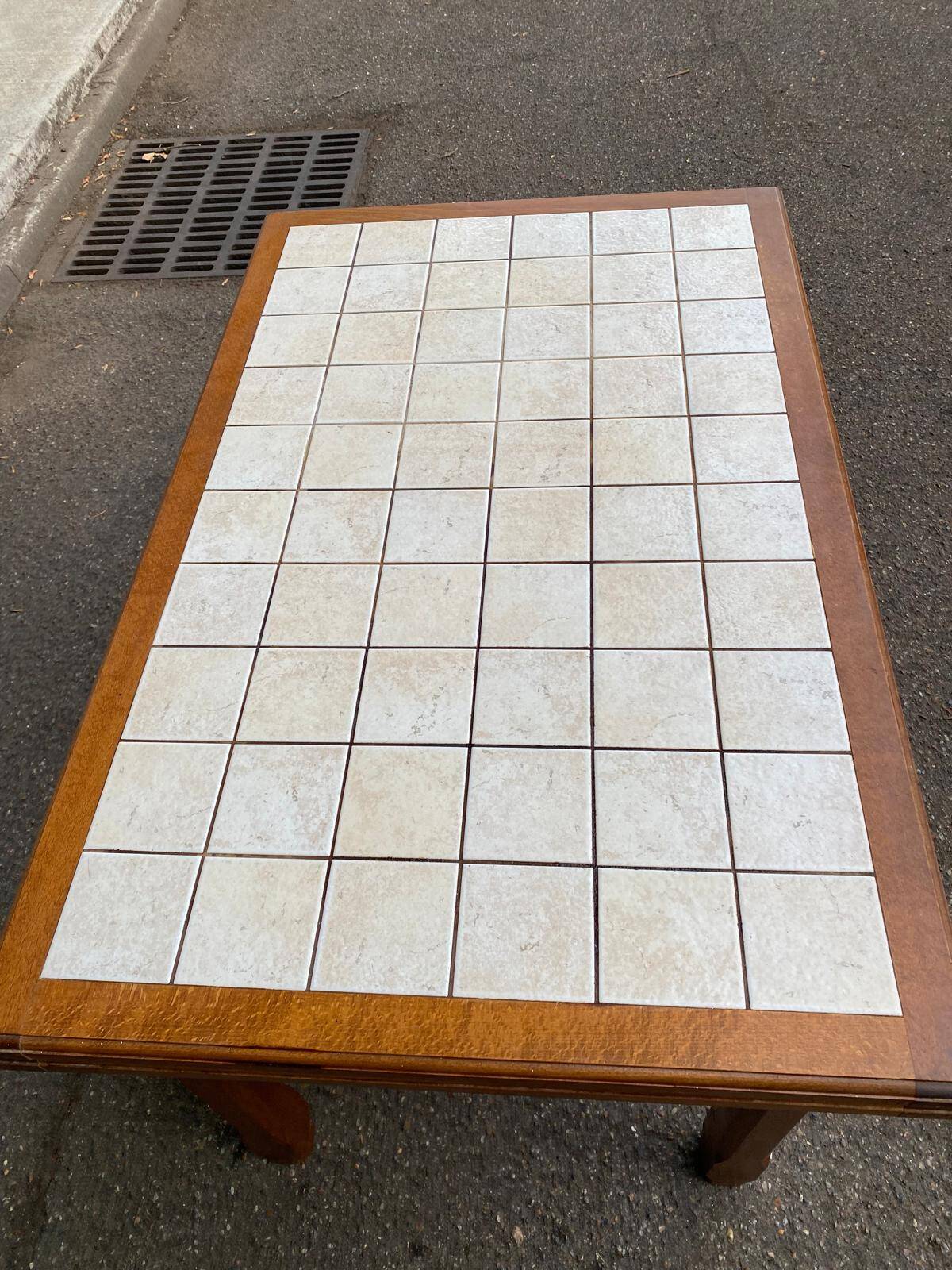 Dining table or farmhouse kitchen style with solid wood and tiles.